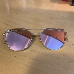 Women’s pink lense sunglasses